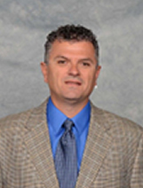 Mr. Michael Serghiou